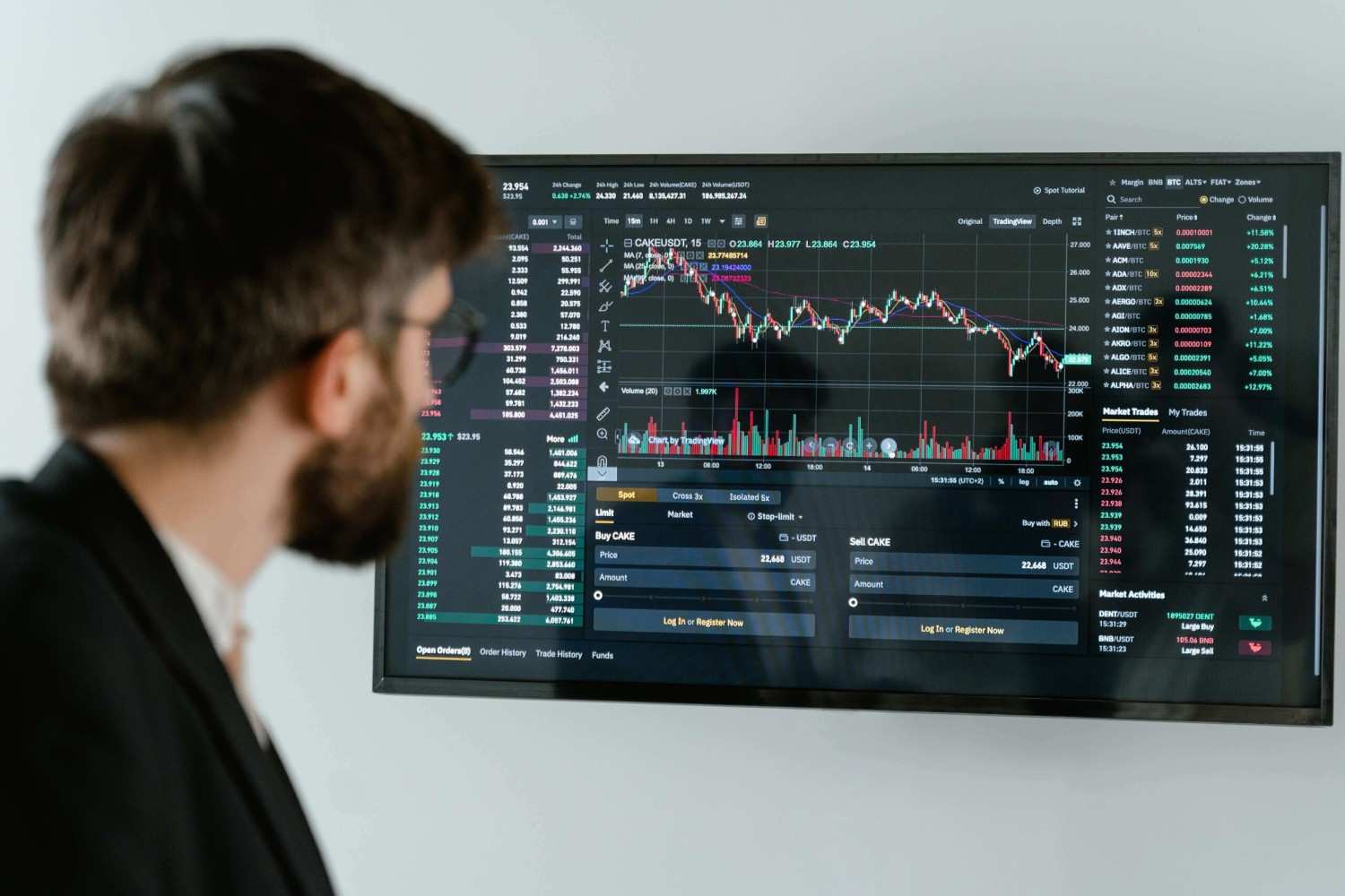 Man looking at data on screen